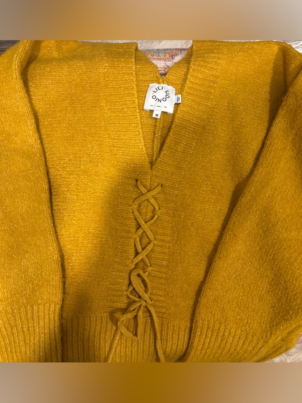 V-neck mustard sweater
